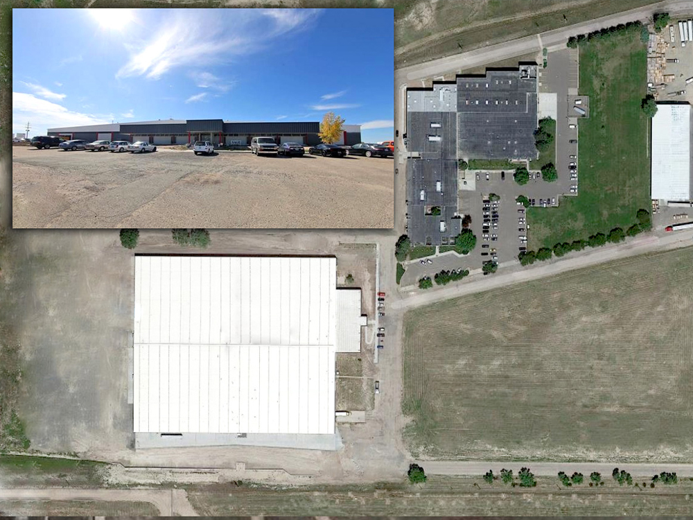 Aerial view of APW Wyott, Inc. facility in Cheyenne, WY, showcasing the extensive roof coated for enhanced durability and waterproofing