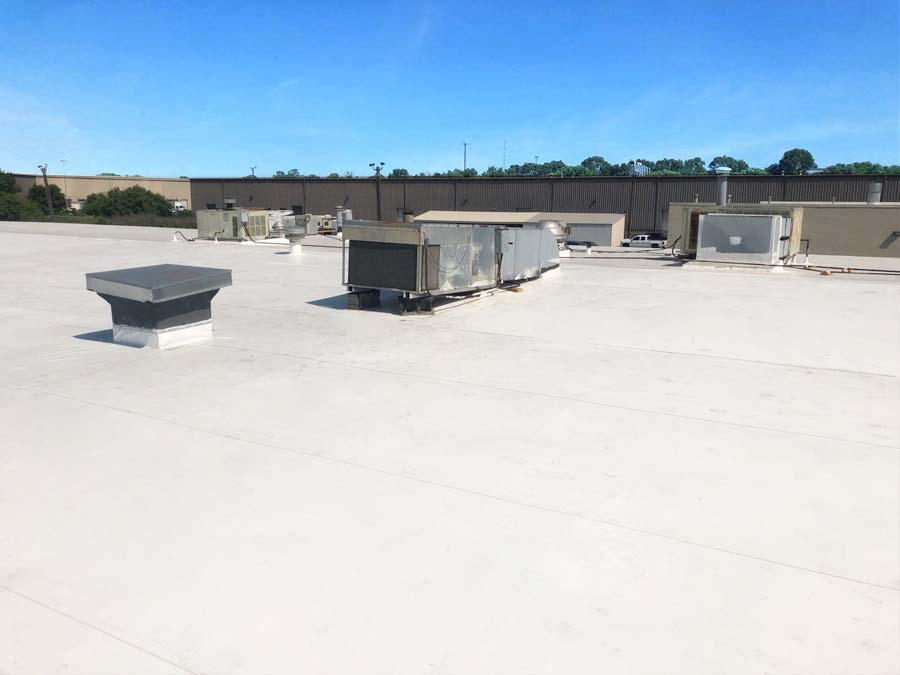 Energy-efficient single-ply roofing system installation at Omaha Bakery Supply, Omaha, NE