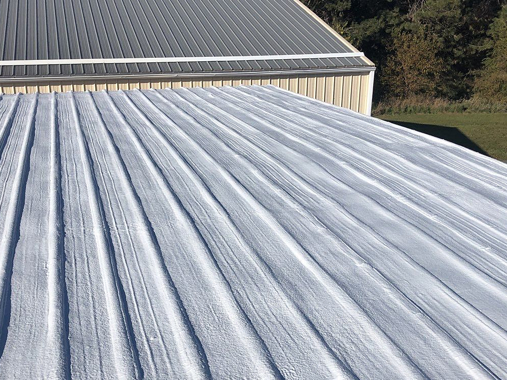 Spray foam roofing installation at Punch Henn, LLC in Norfolk, NE